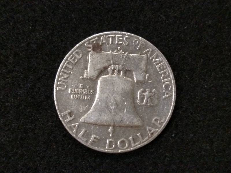 lot 124 image: 1957 D Franklin Silver Half Dollar...
