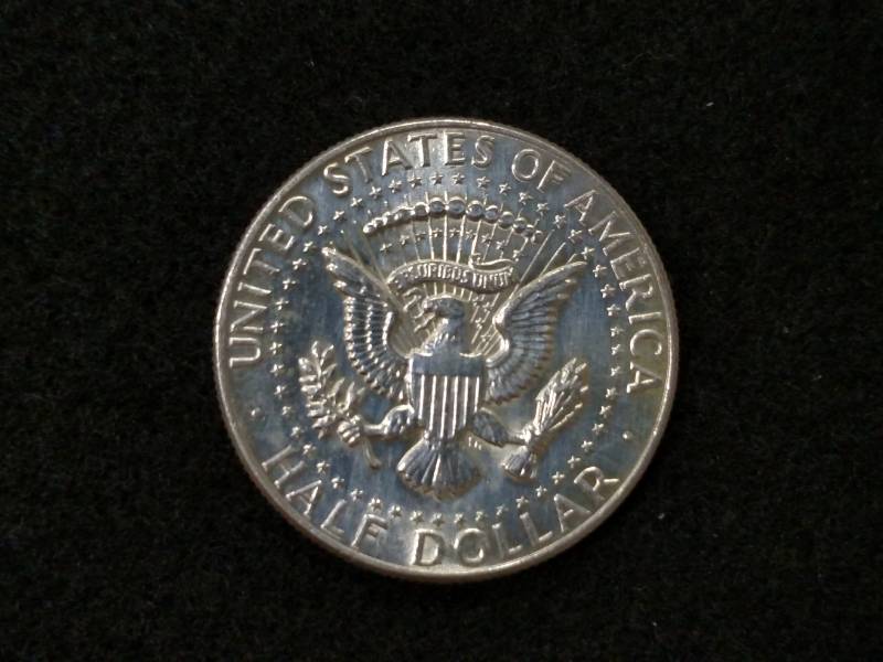 lot 135 image: 1964 Kennedy BU Silver Half Dollar...