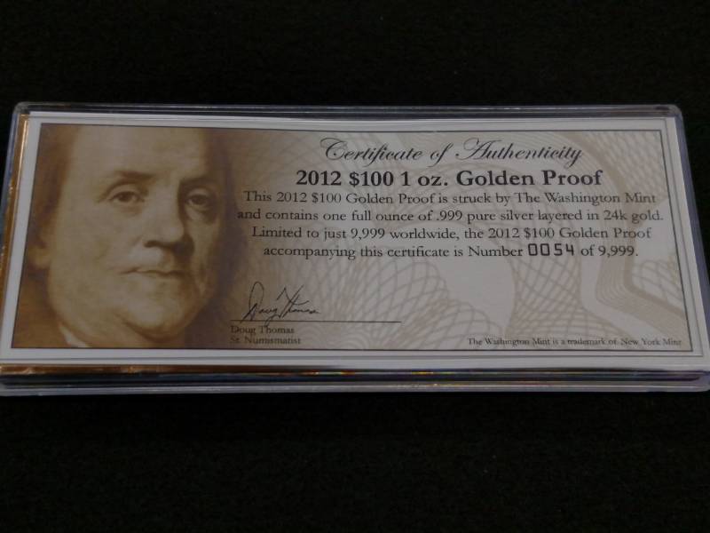 lot 160 image: 2012 Gold Plated One Ounce .999 Sil...
