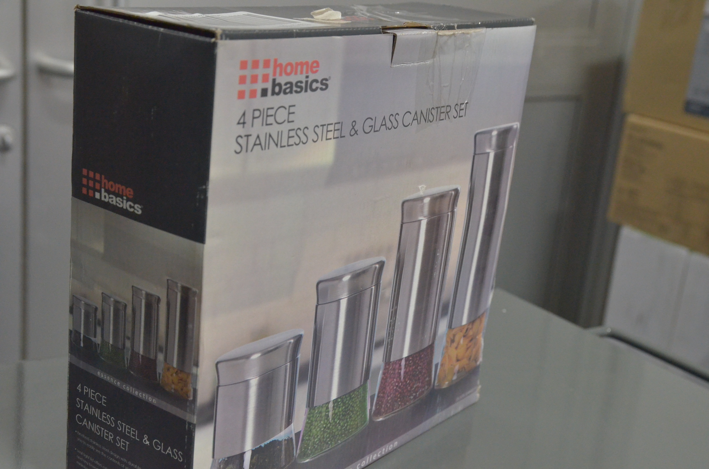 lot 21 image: Essence Stainless Steel Canister Set (4-Piece)