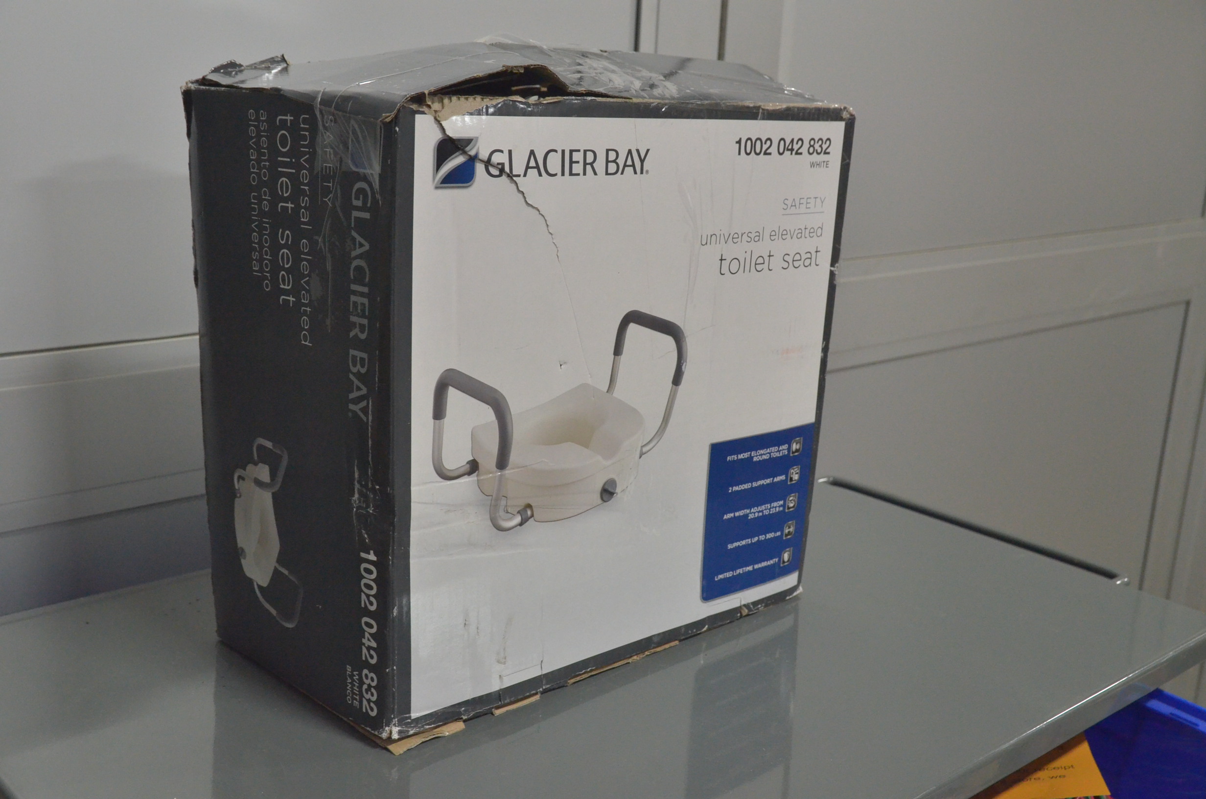 lot 38 image: 1-Piece Adjustable Elevated Toilet Seat in White Color