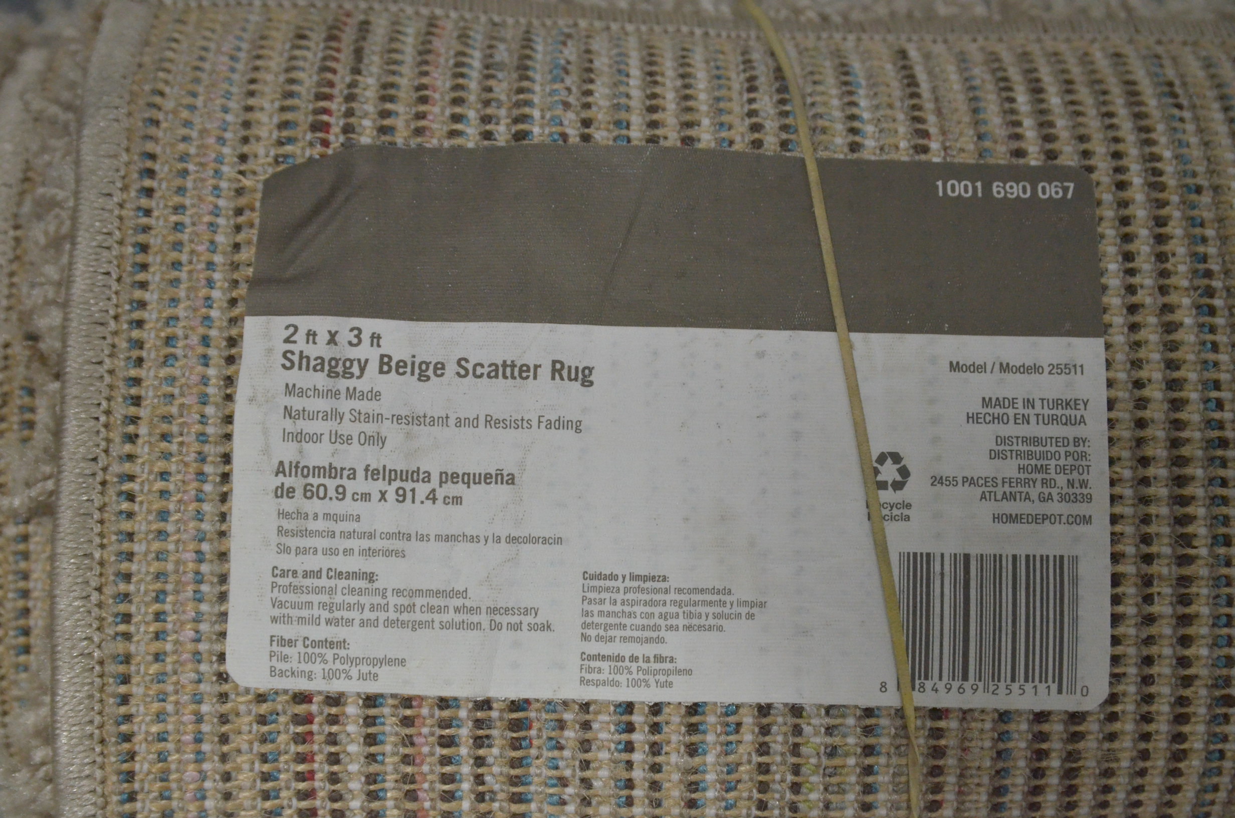 lot 55 image: Shaggy Beige 2 ft. x 3 ft. Scatter Rug