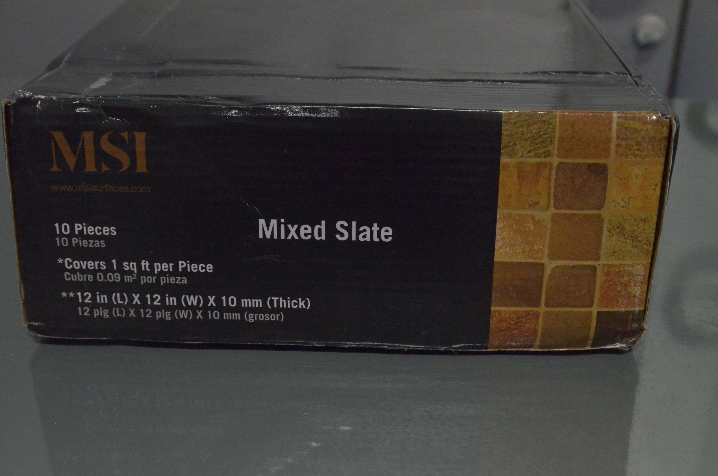 lot 62 image: 10 pack MSI Mixed Color 12 in. x 12 in. x 10mm Tumbled Slate Mesh-Mounted Mosaic Tile (10 sq. ft.  case)