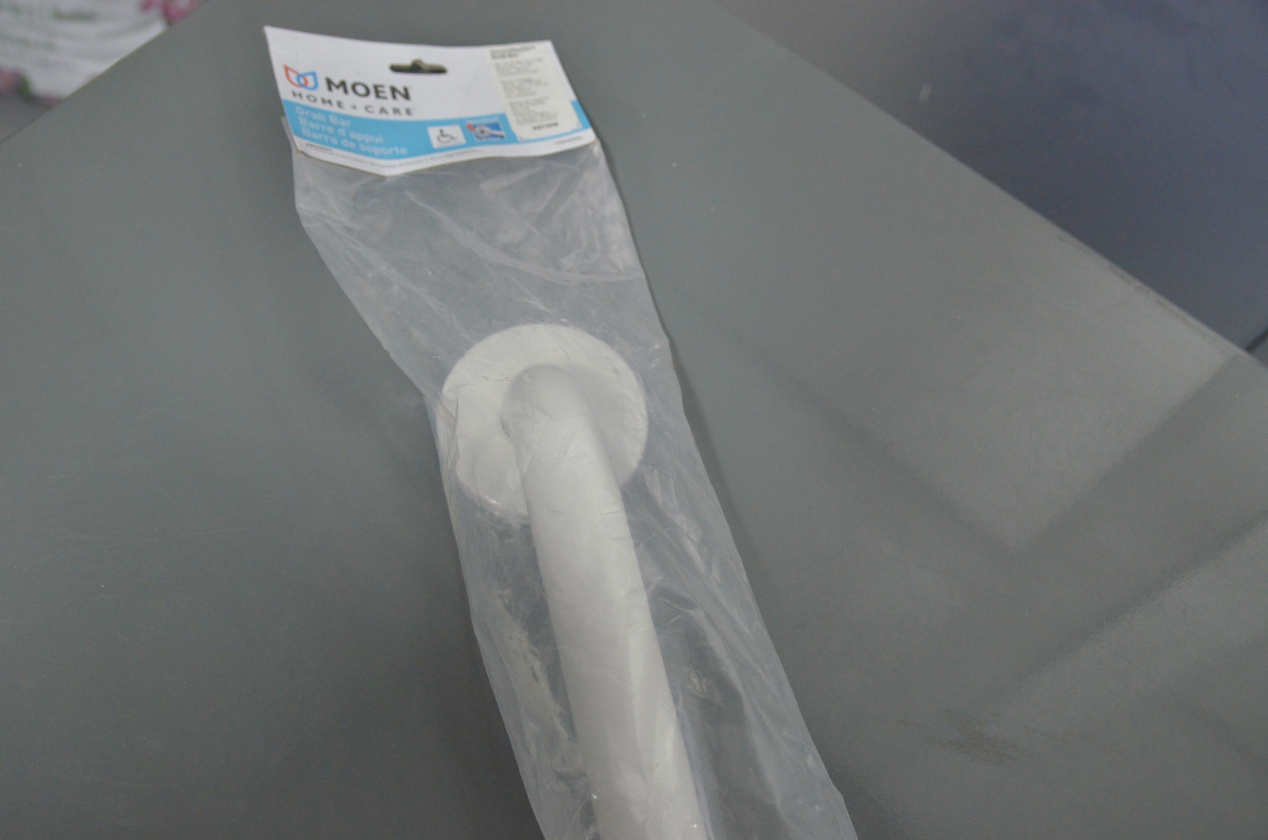 lot 74 image: Moen Home Care 30 in. x 1-14 in. Concealed Screw Grab Bar in White