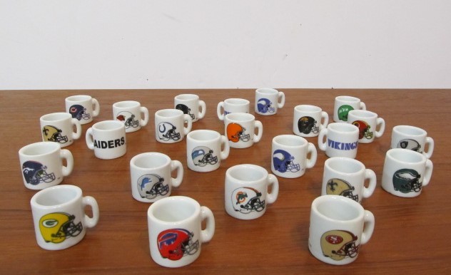 lot 12 image: Lot of Small NFL Ceramic Mugs wDisplay Shelf