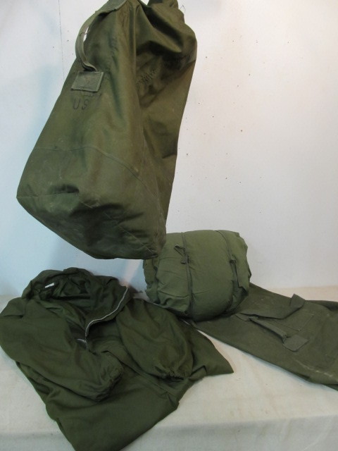 lot 14 image: Vintage Military Jumpsuit Sleeping Bag Duffel etc