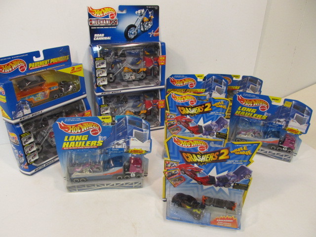 lot 42 image: Group of Brand New HOT WHEELS Crashers Long Haulers & Others