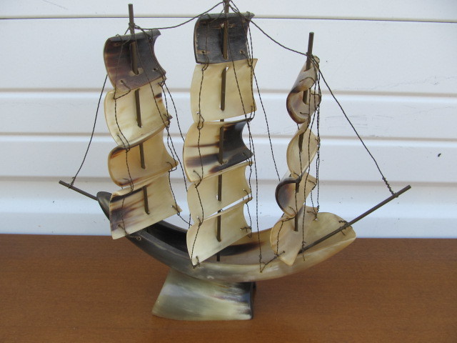 lot 127 image: Vintage Carved Buffalo Horn Pirate Ship