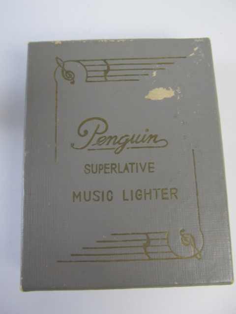 lot 19 image: 2 Vintage Cigarette Lighters