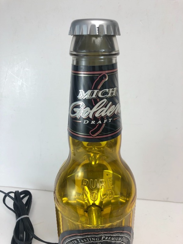 lot 290 image: Lighted MGD Advertising Beer Bottle Sign