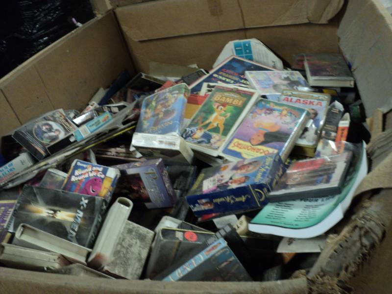 lot 114 image: Pallet of VCR Tapes and DVDs, Reco...