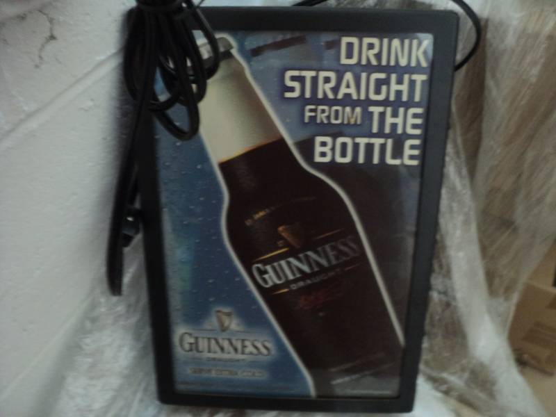 lot 254 image: Guinness Light needs bulb...