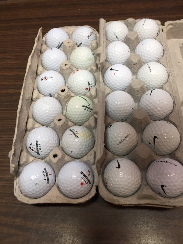 lot 40 image: 2 Dozen Golf Balls - Nike & Bridgestone