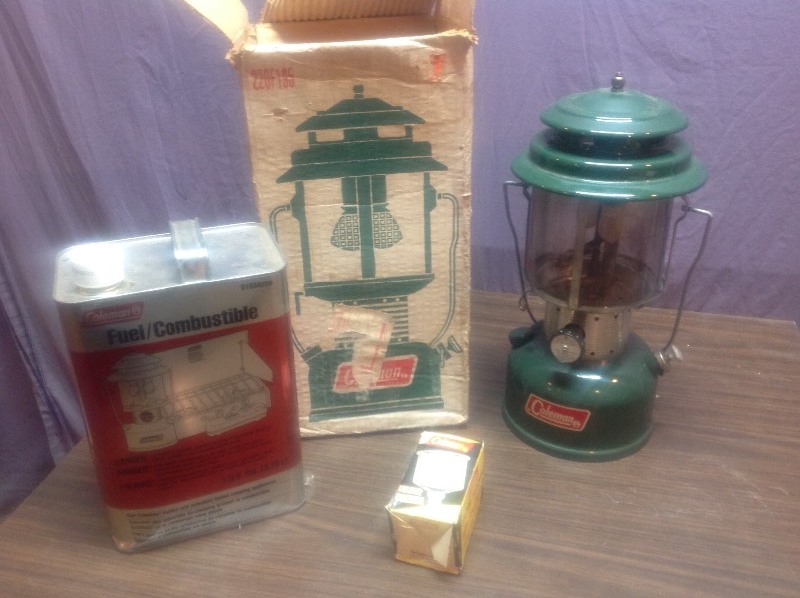 lot 55 image: Coleman Lantern with Fuel, Funnel and Mantles