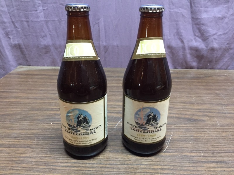 lot 77 image: ND Centennial Beer Bottles