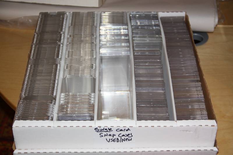 lot 39 image: Monster Box Full of Single Sports Card Snap Cases