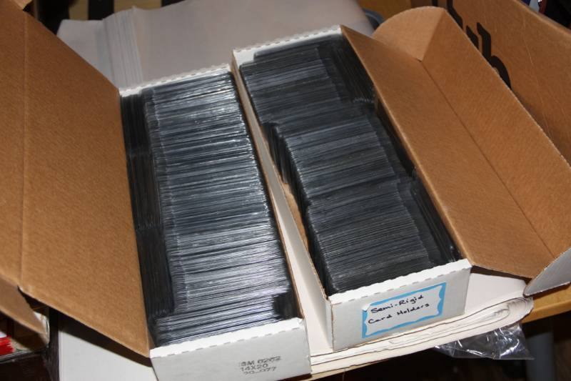 lot 40 image: Two Single Row Boxes Full Of Semi Rigid Sports Card Cases