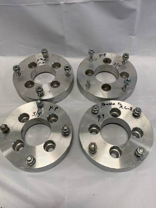 lot 21 image: Yamaha to Polaris Wheel Spacer 4-110  4-156