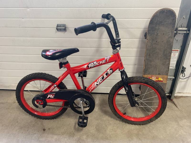 lot 103 image: Rocket Bike & Skateboard
