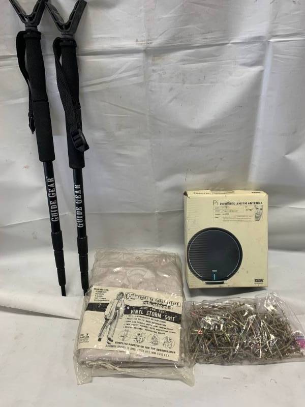 lot 104 image: Walking Sticks, Storm Suit, Drywall Screws, Powered Antenna