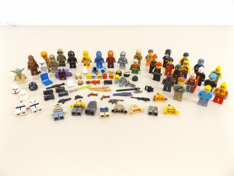 lot 10 image: Lot of Misc. Lego Minifigures, parts, Weapons, etc.