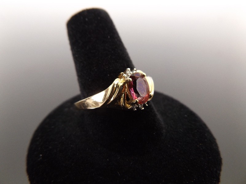 lot 64 image: 10k Yellow Gold Garnet Diamond Accented Ring Size 10