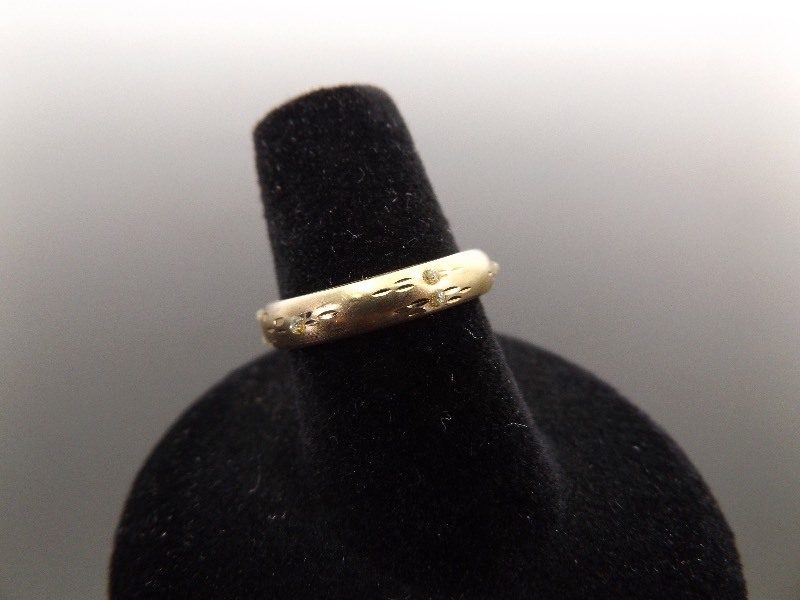 lot 67 image: 10k Yellow Gold Etched Design Diamond Accented Ring Size 6.5
