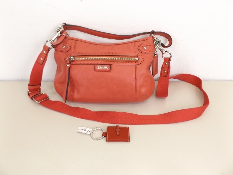 lot 83 image: Coral&nbspCOACH&nbspDaisy Leather Crossbody Handbag and Picture Frame Keyfob