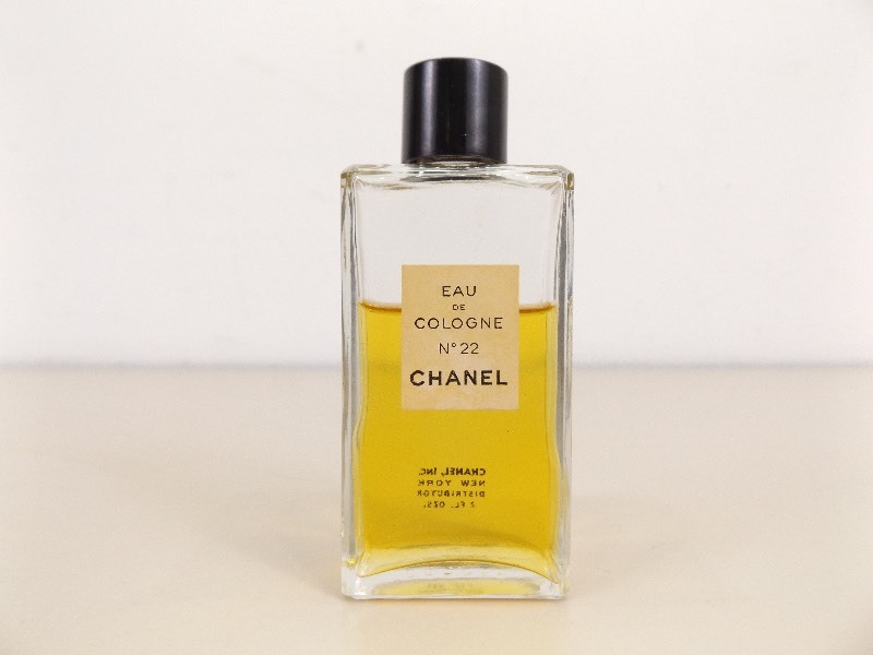 lot 81 image: 2 Ounce, 23 Full CHANEL No. 22 Perfume Bottle