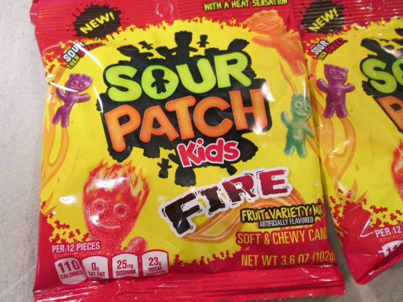 lot 50 image: 12 Bags of Sour Patch Kids Fire Can...