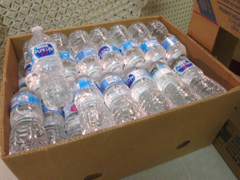 lot 126 image: Banana Box Full of 16.9 oz Nestle P...