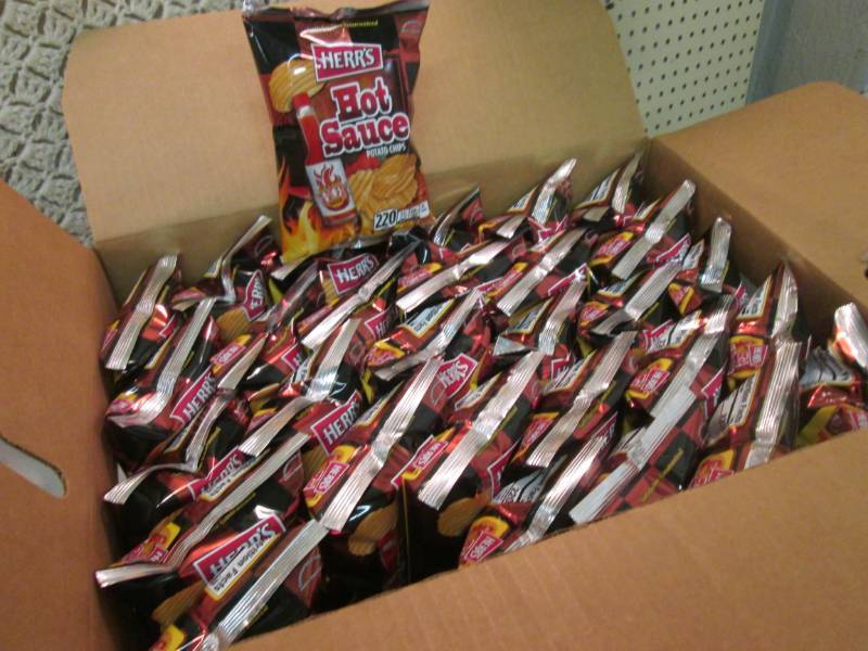 lot 146 image: Case of 30 Bags of Herrs Hot Sauce...