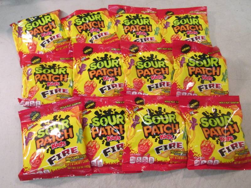 lot 181 image: 12 Bags of Sour Patch Kids Fire Can...
