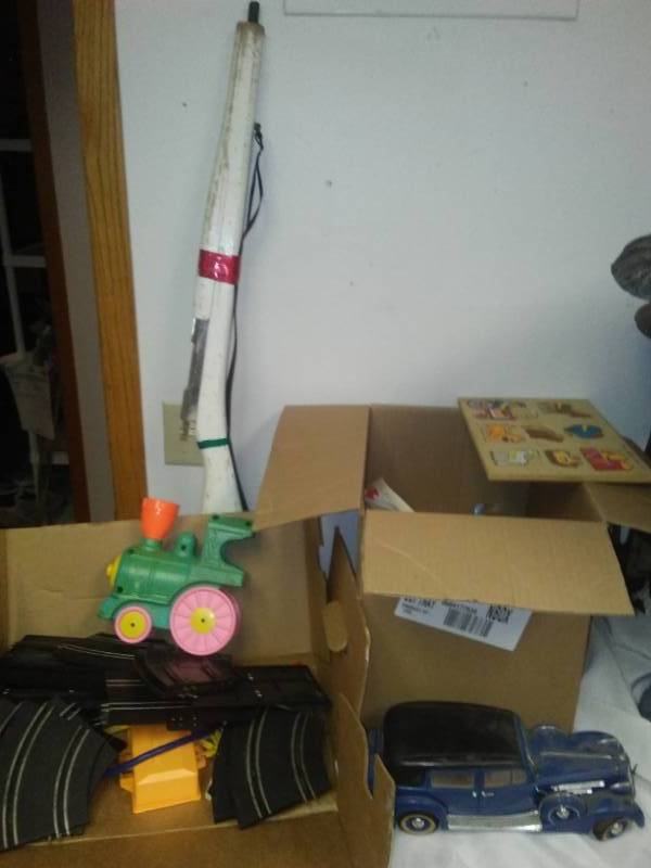 lot 72 image: Toys - 2 boxes plus a wooden toy rifle.