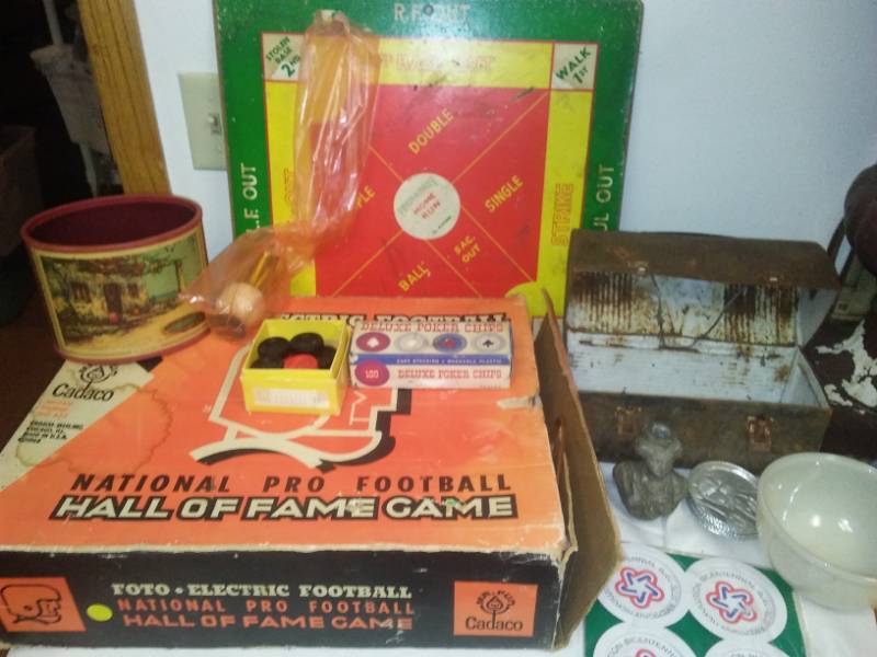 lot 123 image: Miscellaneous games, lunch box, Fire King bowl and more.