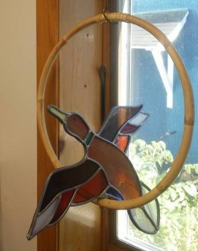 lot 154 image: Stained glass hanging duck