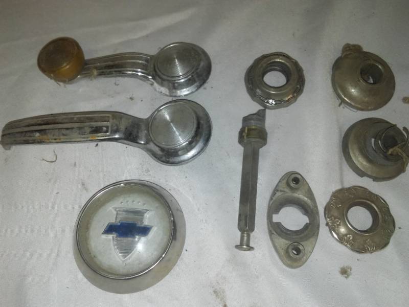 lot 206 image: Miscellaneous Auto bezels handles  - Chevy.