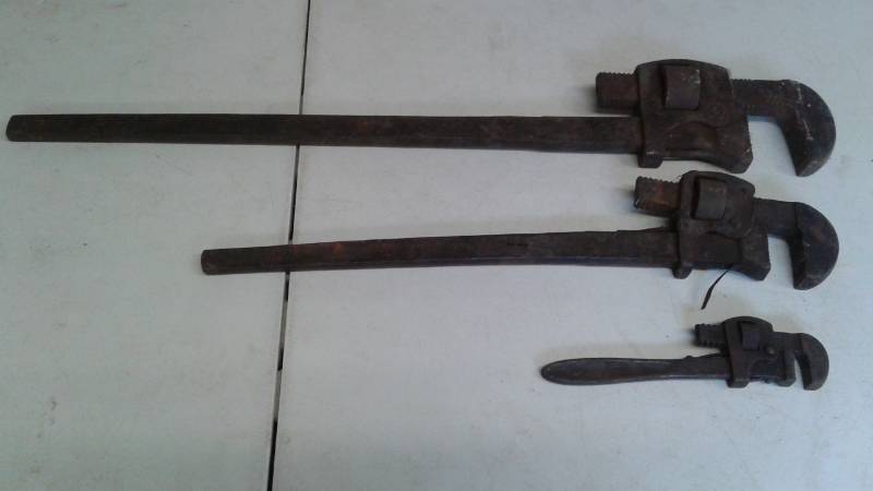 lot 65 image: Lot Of Three Vintage Pipe Wrenches, One Is Very Large, Medium One Has Some Welded Repair Work Done To It