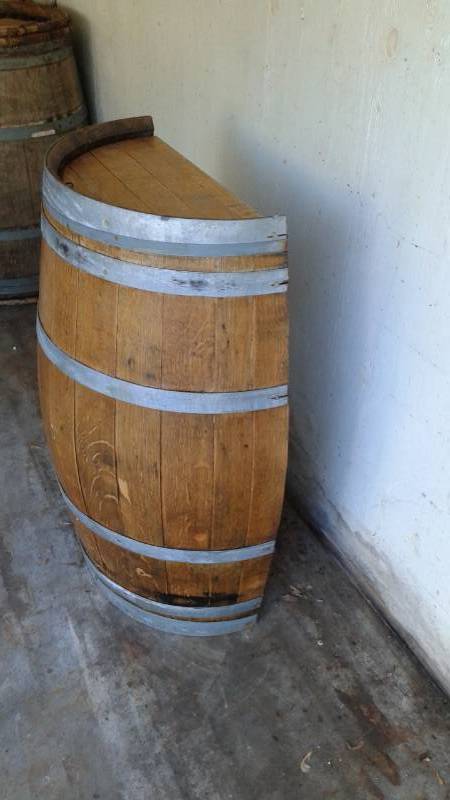 lot 11 image: Half A Wine Barrel With A Wine Rack Inside