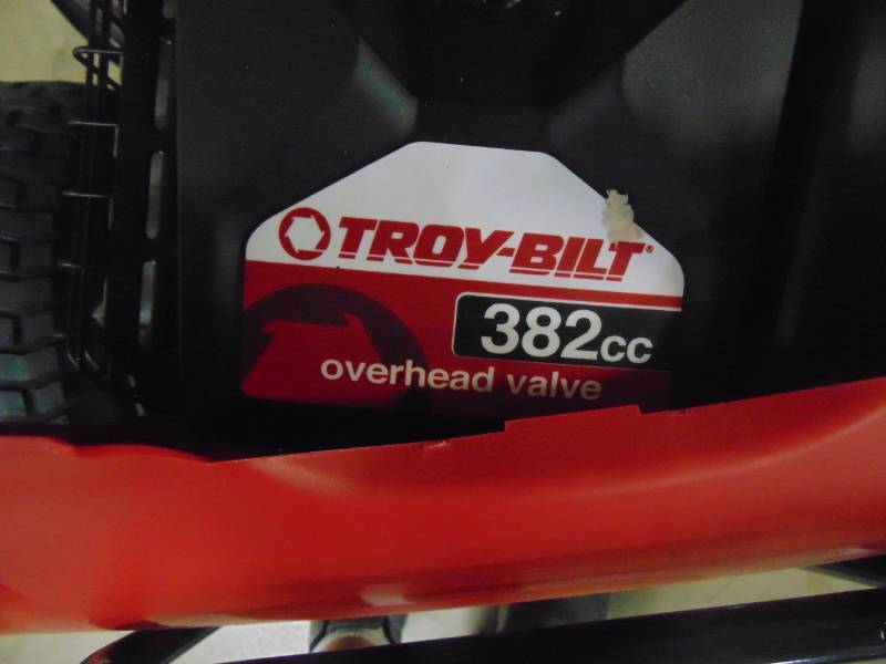 lot 504 image: Troy-Bilt Neighborhood Rider 30 in. 382 cc OHV Engine Manual Drive Gas Rear Engine Riding Mower with 6 speeds and Auto Choke TB30