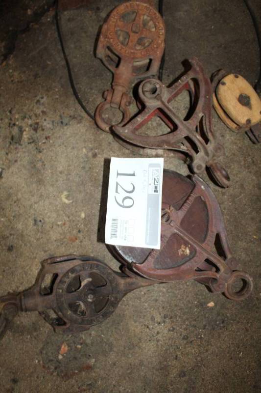 lot 129 image: Old Metal Pulleys