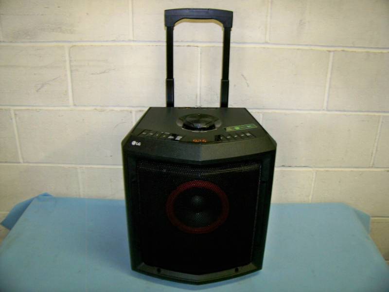 lot 42 image: LG, 50W, Portable Loudspeaker with Bluetooth Connectivity, Telescoping Handle and Wheels in Original Box
