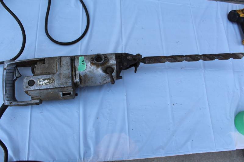 lot 28 image: Milwaukee Concete Drill with Bit