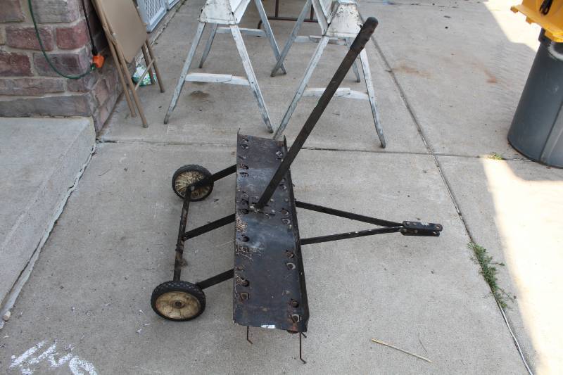 lot 53 image: Garden Tractor Pull-Behind Manual Yard Dethatcher
