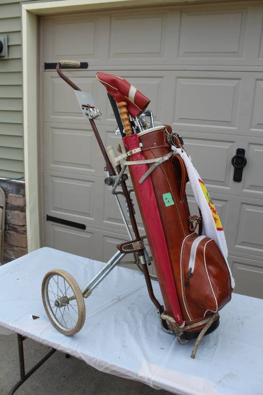 lot 69 image: ProGroup Inc. Hot Z Golf Club Set with Rolling Caddy Bag, Clubs, Irons
