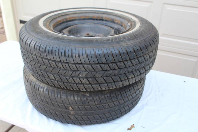 lot 79 image: Lot of (2) Prodigy Premium P20575R14 95S White Wall Passenger Tires with 5-Lug 14in. Steel Wheels