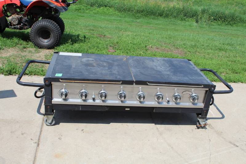 lot 80 image: Bakers and Chefs 8-Burner Folding Rolling Propane Grill with Dual Fold-Out Side Table