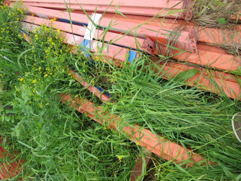 Ten assorted pallet rack crossbars...