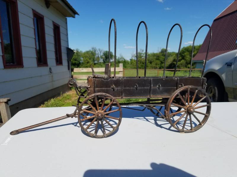 lot 44 image: Heavy Metal ornamental old west wagon