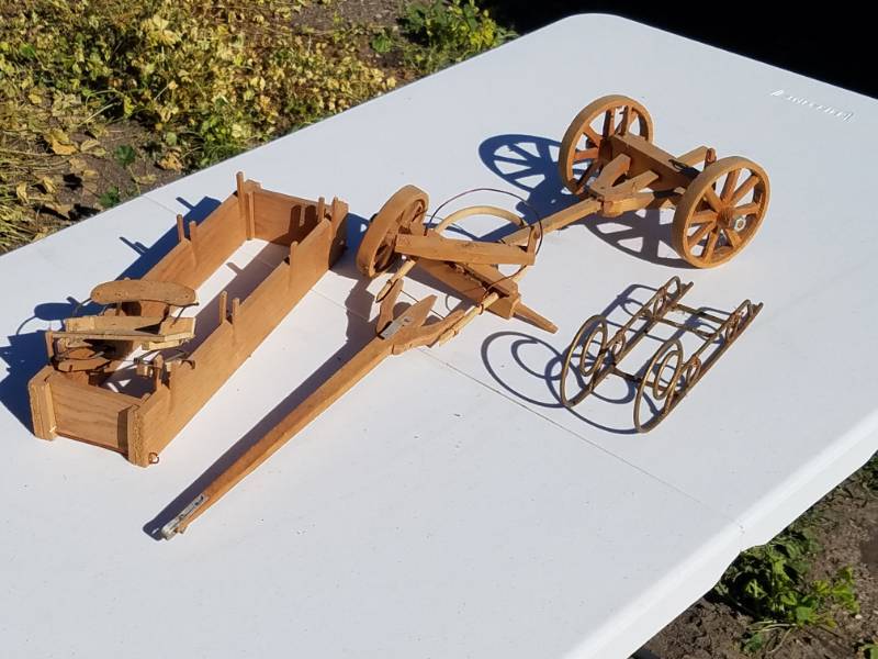 lot 47 image: Wood wagon parts and metal slay